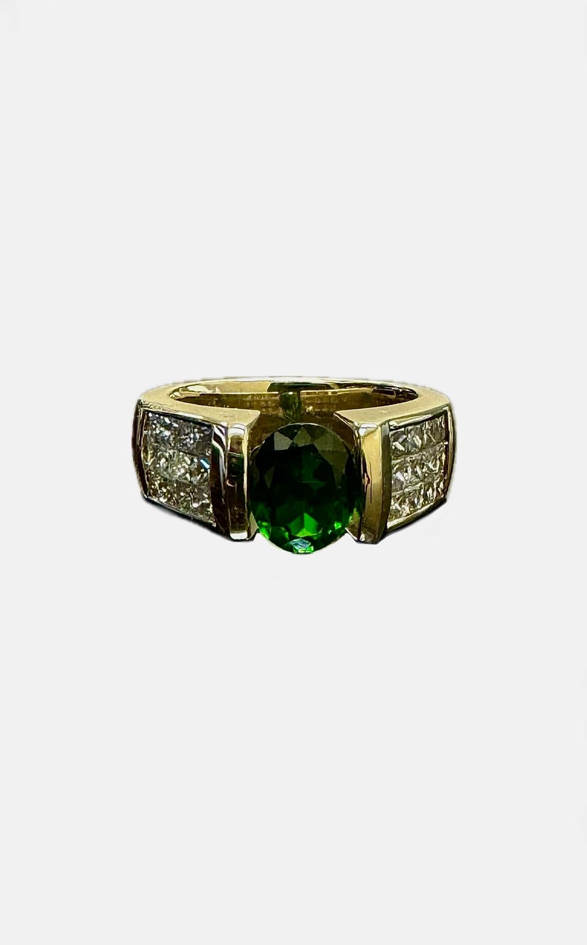 DeKara Designs Collection

Modern Oval Tsavorite Garnet Princess Cut Invisible Diamond Engagement Ring. Very modern, sparkly, and gold with a beautiful yellow gold engagement ring.

Metal-14K Yellow Gold, .583

Stones- Genuine Oval Tsavorite Garnet