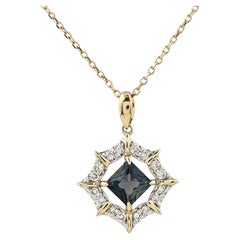 Colgante de oro amarillo de 14 quilates con forma de halo de estrella de topacio azul de Londres de talla princesa
