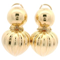 Orecchini a goccia smerlati in oro giallo 14k con fondello Omega
