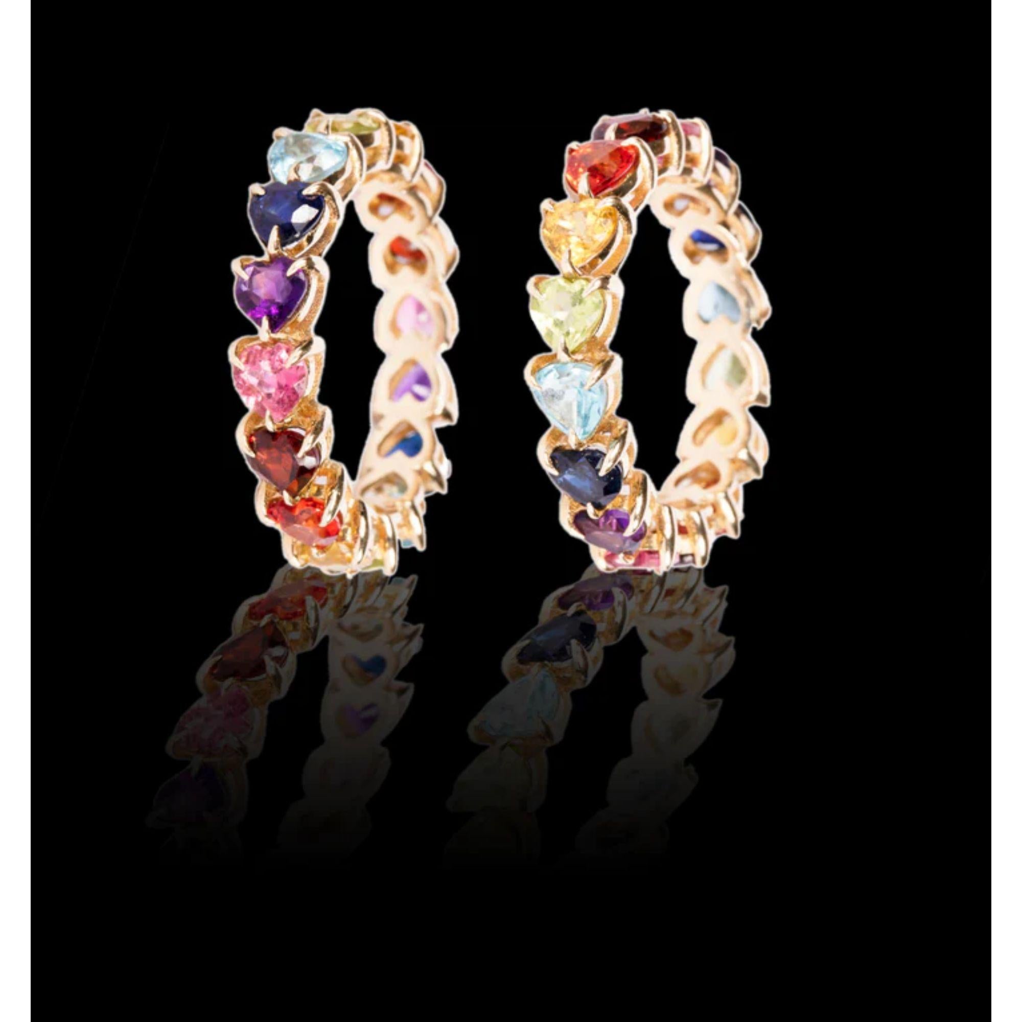 As the first fine jewelry piece from the house of Mordekai, we are celebrating one of our iconic themes, the Rainbow! This unique ring is made of 14k gold, and hand-set with the finest hand-selected, colored stones and gems sourced from all over the