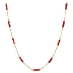Collar de barra con incrustaciones de coral rojo y oro amarillo de 14k Hecho en Italia