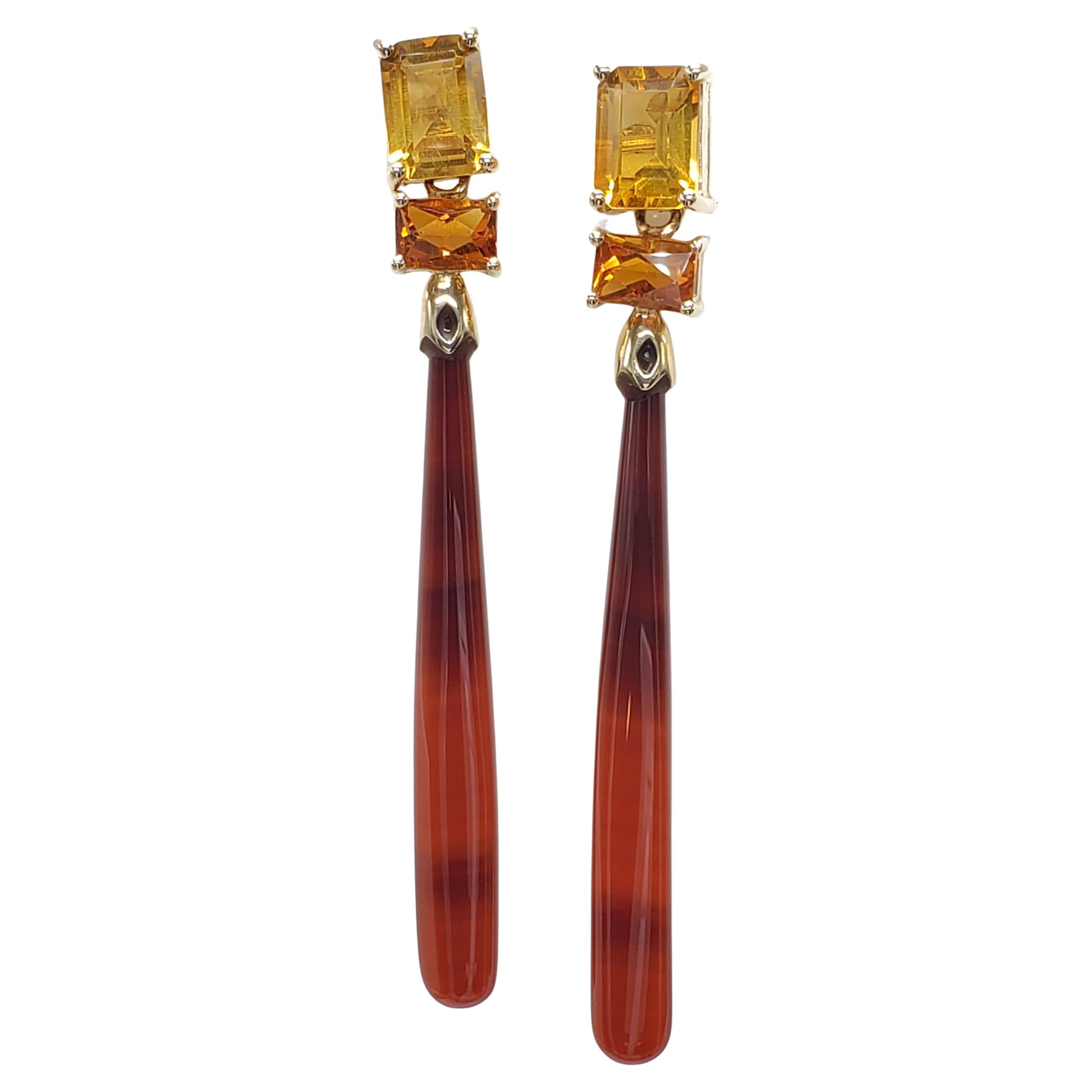 14K solid yellow gold Red onyx and Citrine Earring.
long dangling ,beautiful combination of colors  .
total length is about 2.25 inch long.