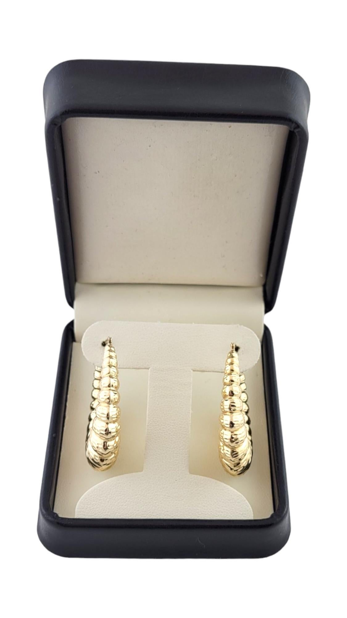 14K Yellow Gold Ribbed Oval Hollow Hoop Earrings #16136 For Sale 3