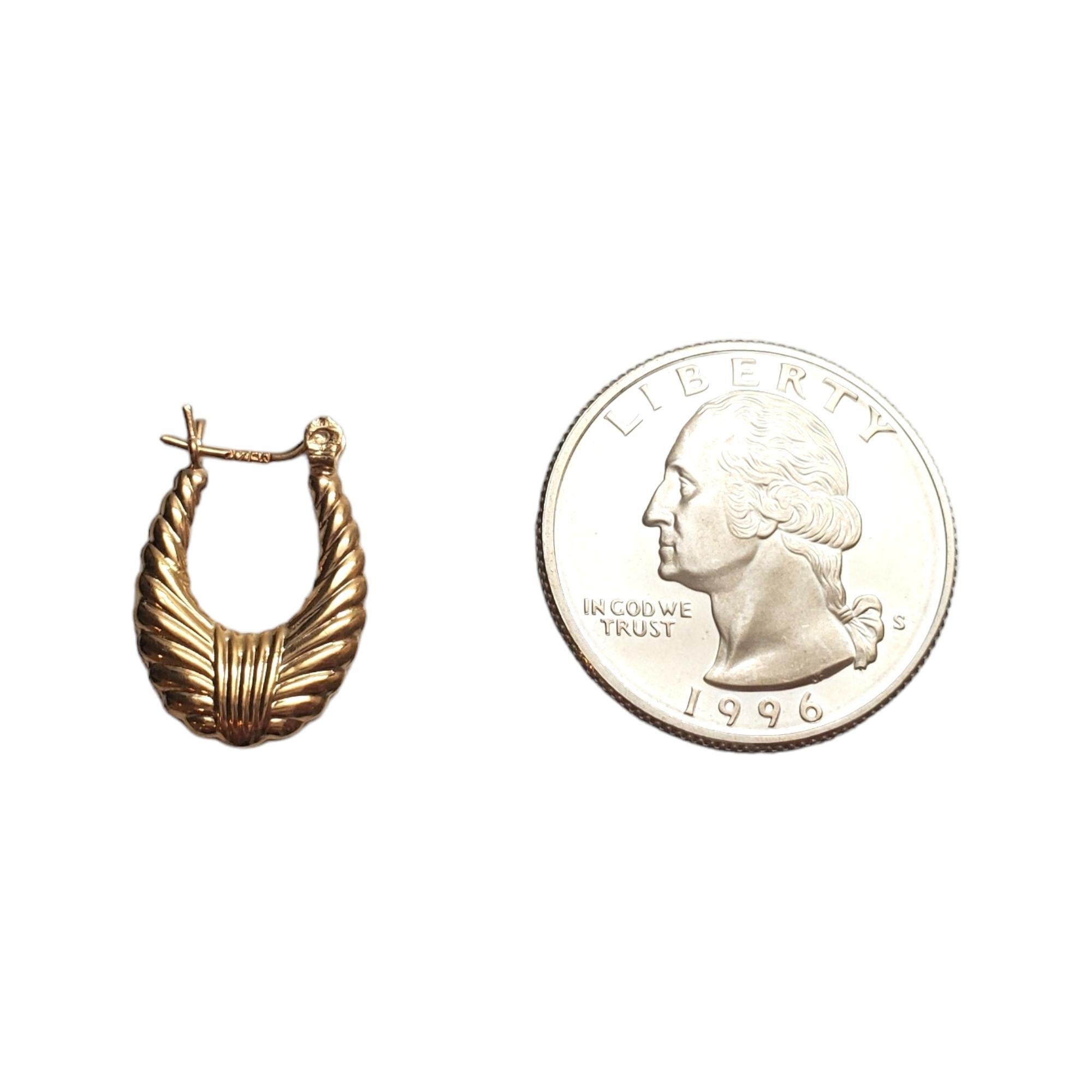 14K Yellow Gold Ribbed Oval Hoop Earrings #17860 1