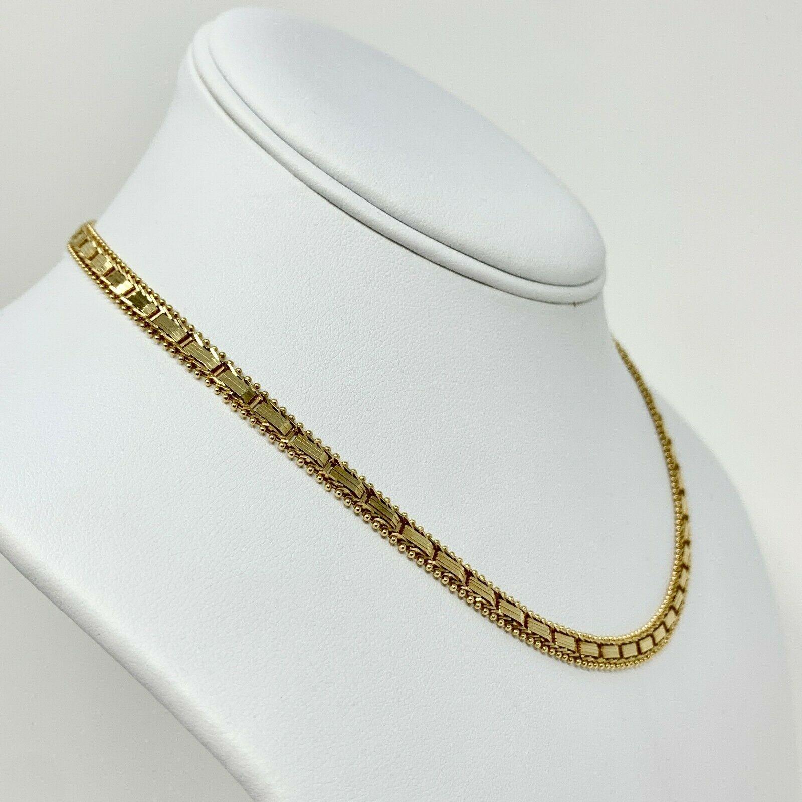 14k Yellow Gold Fancy Riccio Style Collar Link Chain Necklace 16 Inches

Condition:  Excellent (Professionally Cleaned and Polished)
Metal:  14k Gold (Professionally Tested)
Weight:  21.3g
Length:  16 Inches
Width:  5.5mm
Closure:  Box Tab Insert
