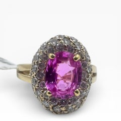 Anello in oro giallo 14K con 1,50 Ct. Zaffiro rosa e diamanti. (Taglia 6.25)