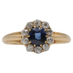 Anillo de Oro Amarillo de 14k con Zafiro natural de 1 ct y 10 Diamantes Brillantes