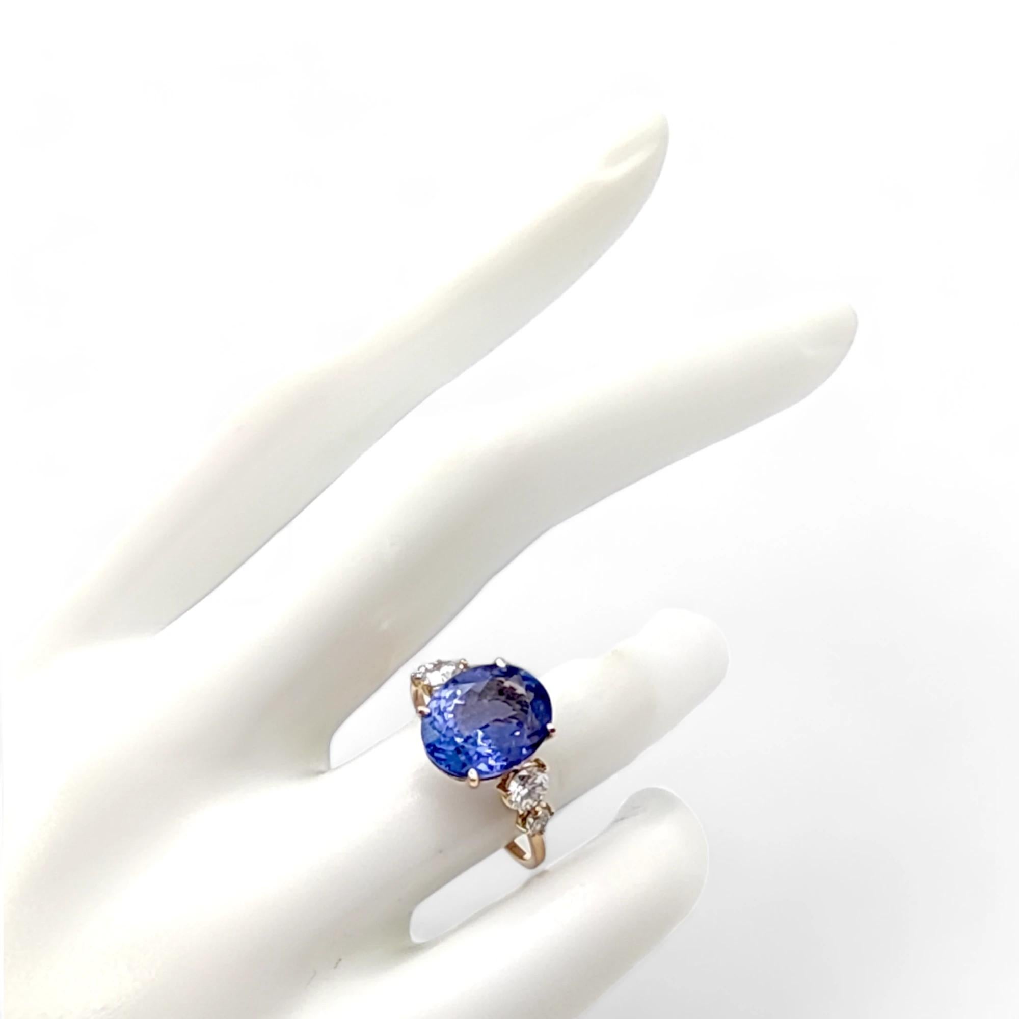 14K yellow  Gold Ring with 2.24 Carat oval Tanzanite and Diamonds For Sale 4