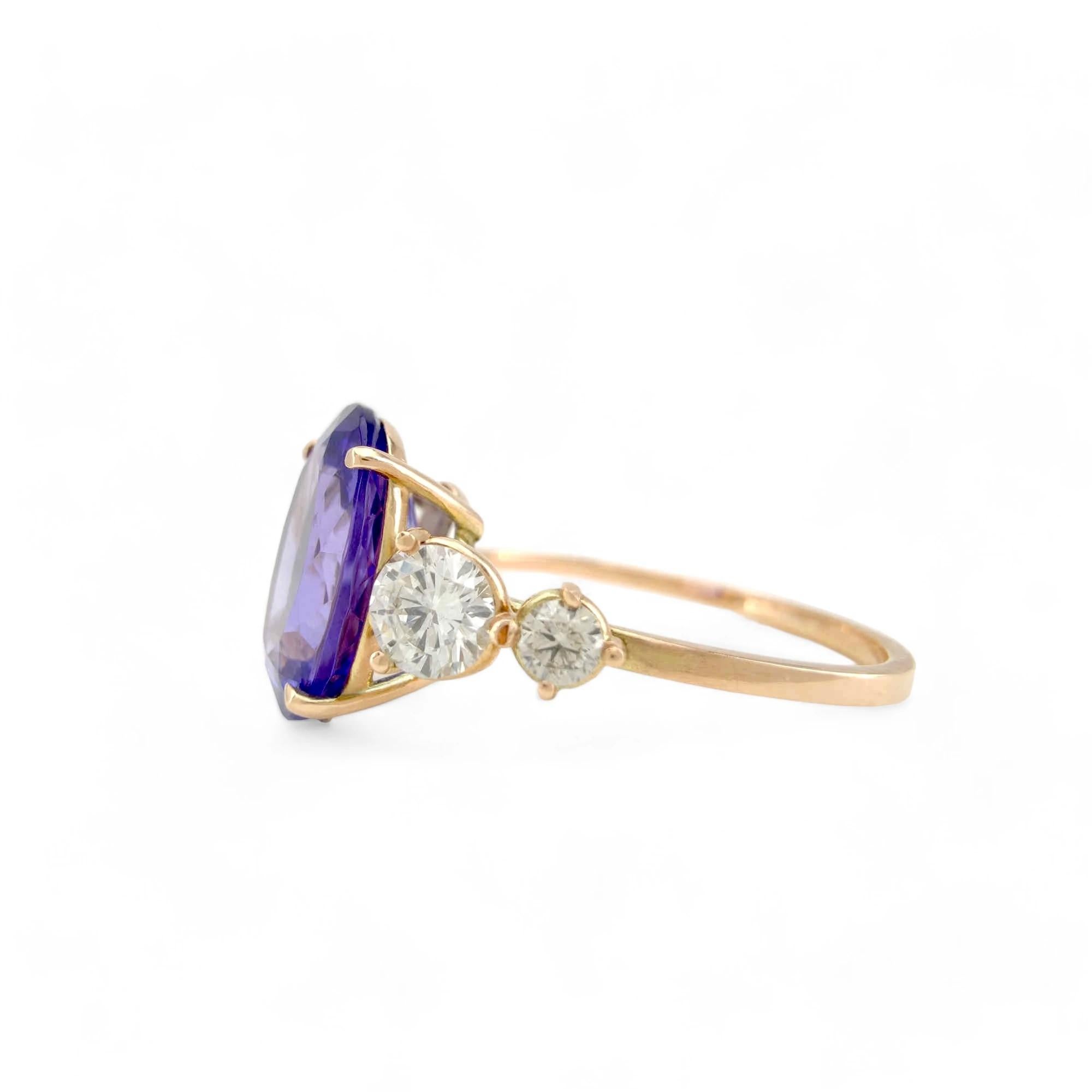 Women's 14K yellow  Gold Ring with 2.24 Carat oval Tanzanite and Diamonds For Sale