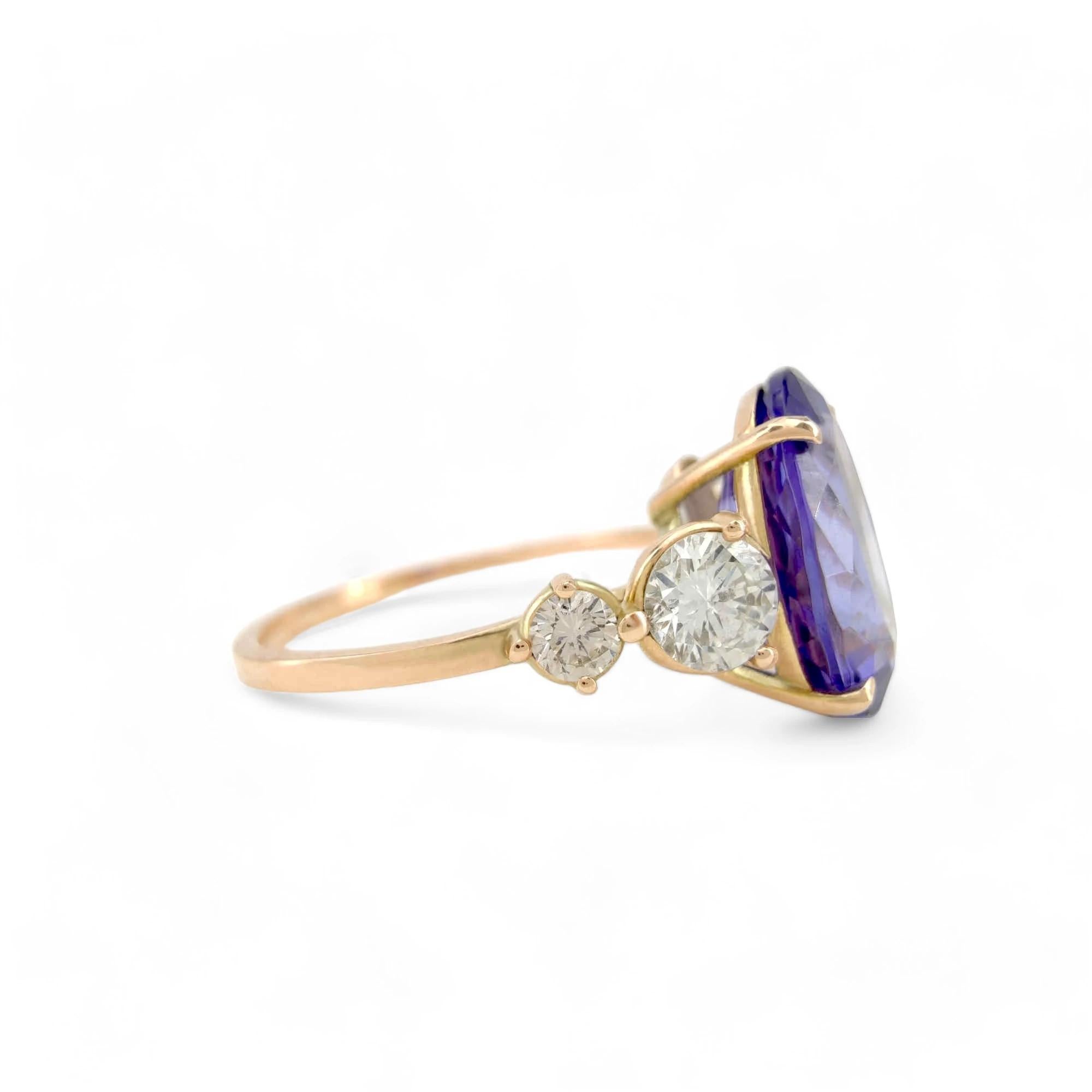 14K yellow  Gold Ring with 2.24 Carat oval Tanzanite and Diamonds For Sale 1