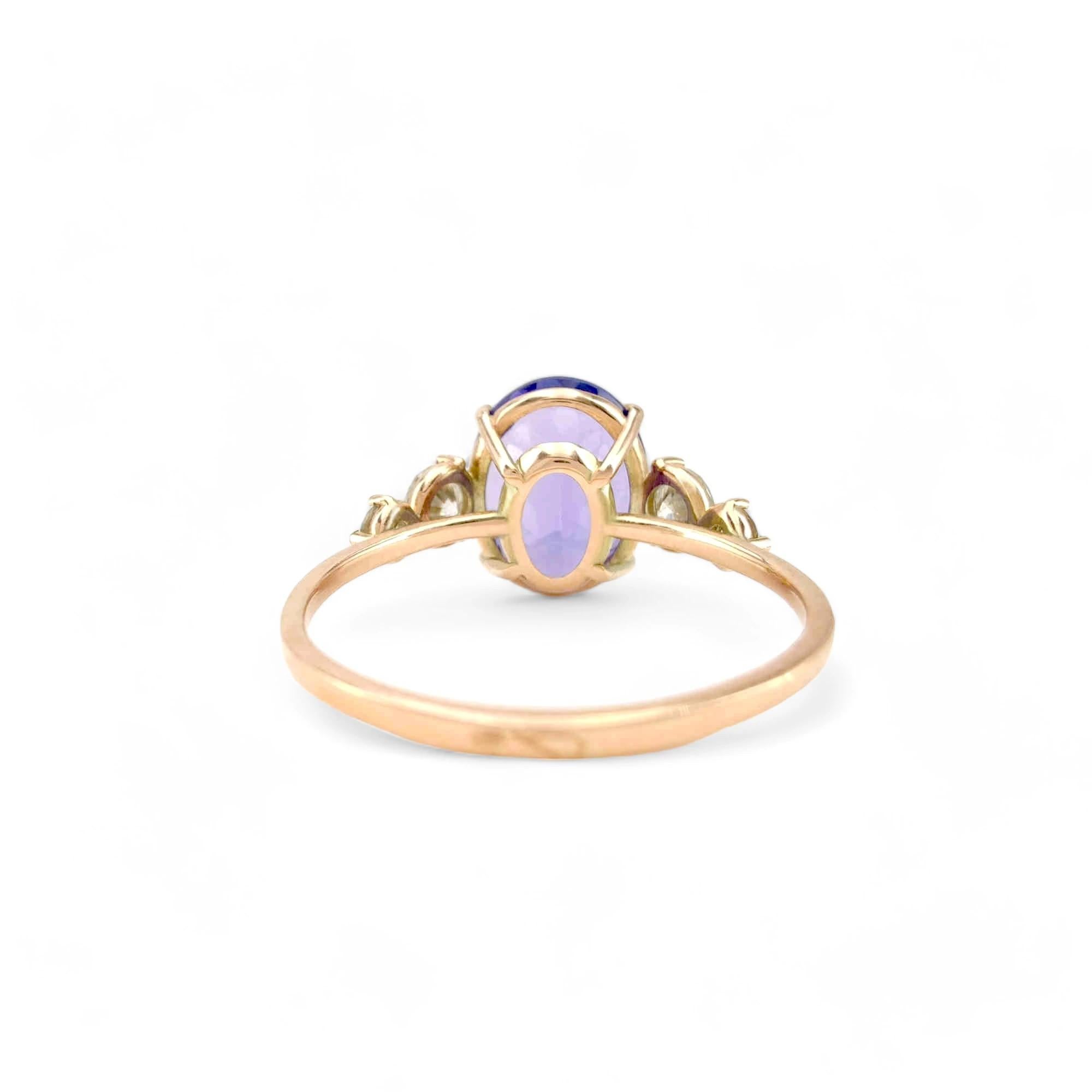 14K yellow  Gold Ring with 2.24 Carat oval Tanzanite and Diamonds For Sale 2