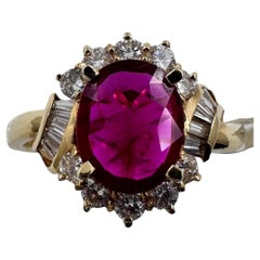 14K Yellow Gold Ring with 2.50 Ct. Ruby and Diamonds. (Size 7.25)