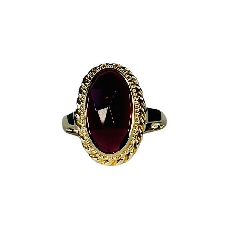14 Karat Gelbgold Ring mit 4,66 Karat ovalem, facettiertem Granat, gestempelt  mit OAK Leaf