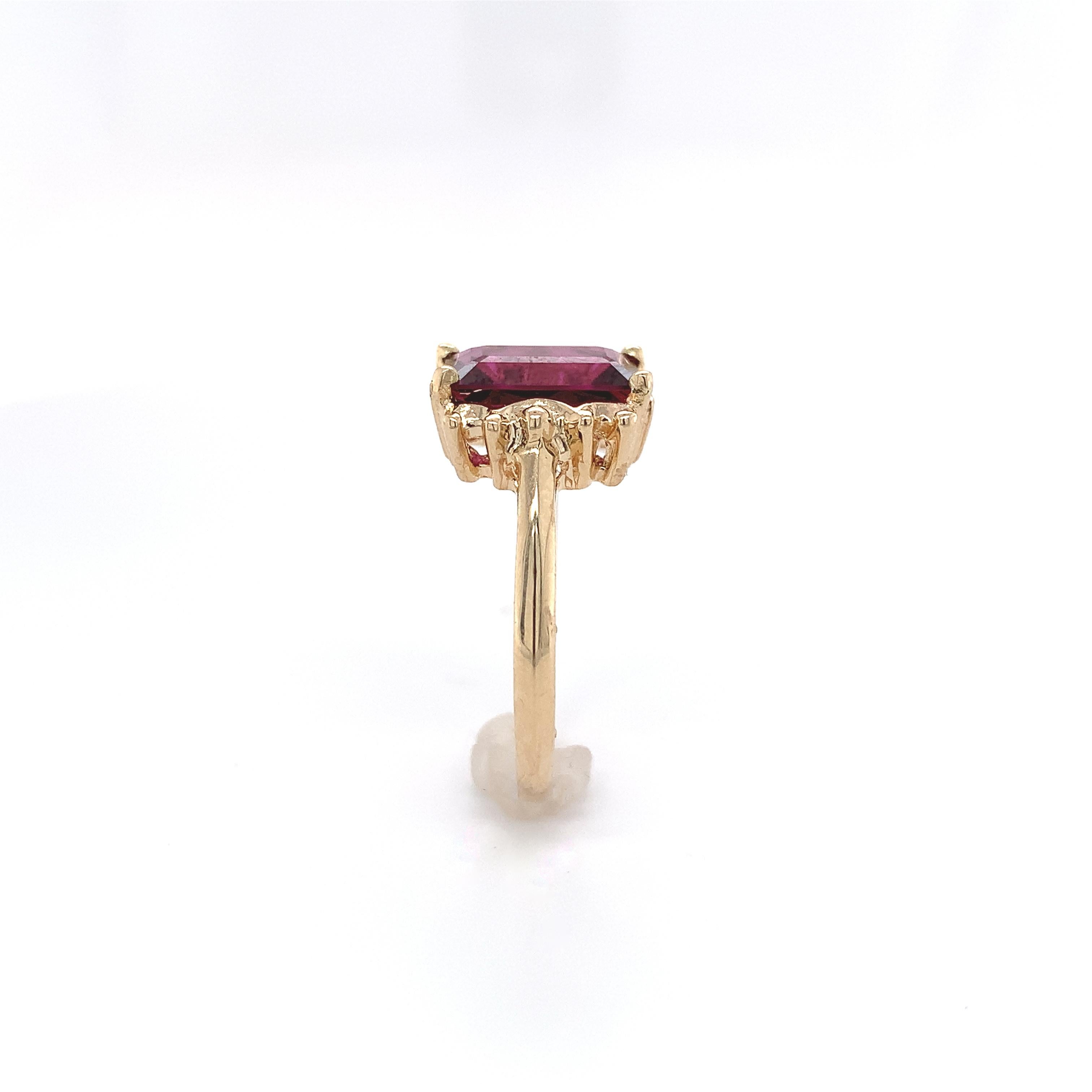 For Sale:  14K Yellow Gold Ring with Emerald Cut 3.51 carat Rhodolite Garnet 3