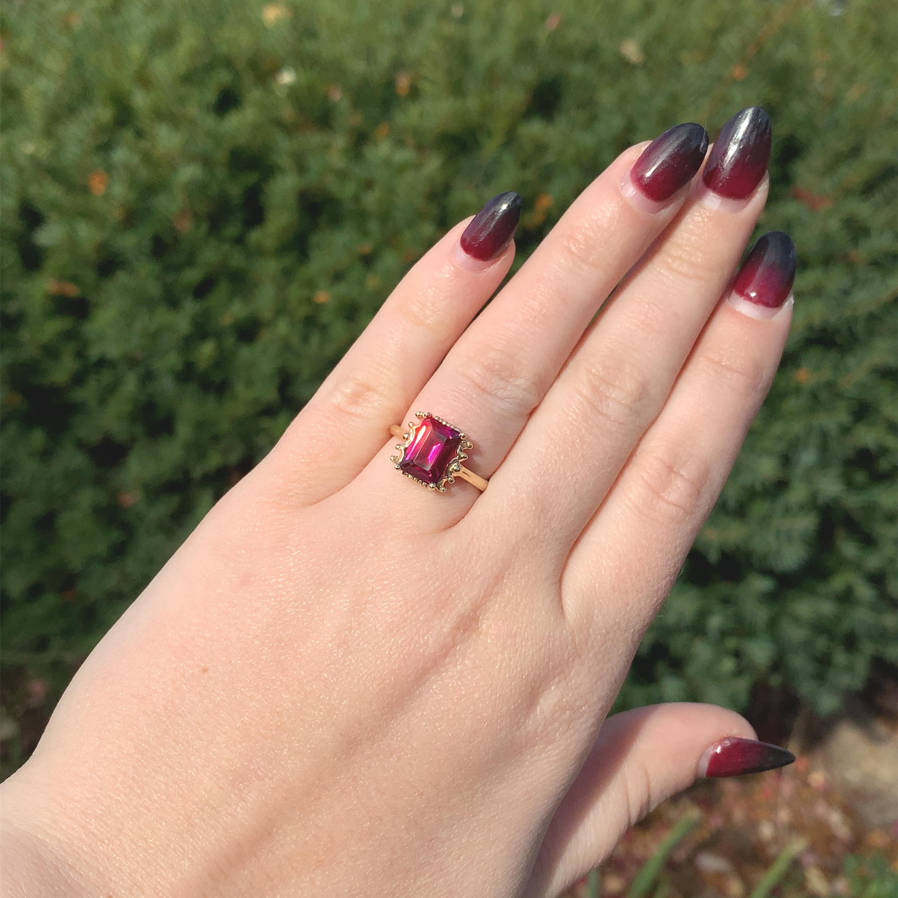 For Sale:  14K Yellow Gold Ring with Emerald Cut 3.51 carat Rhodolite Garnet 6