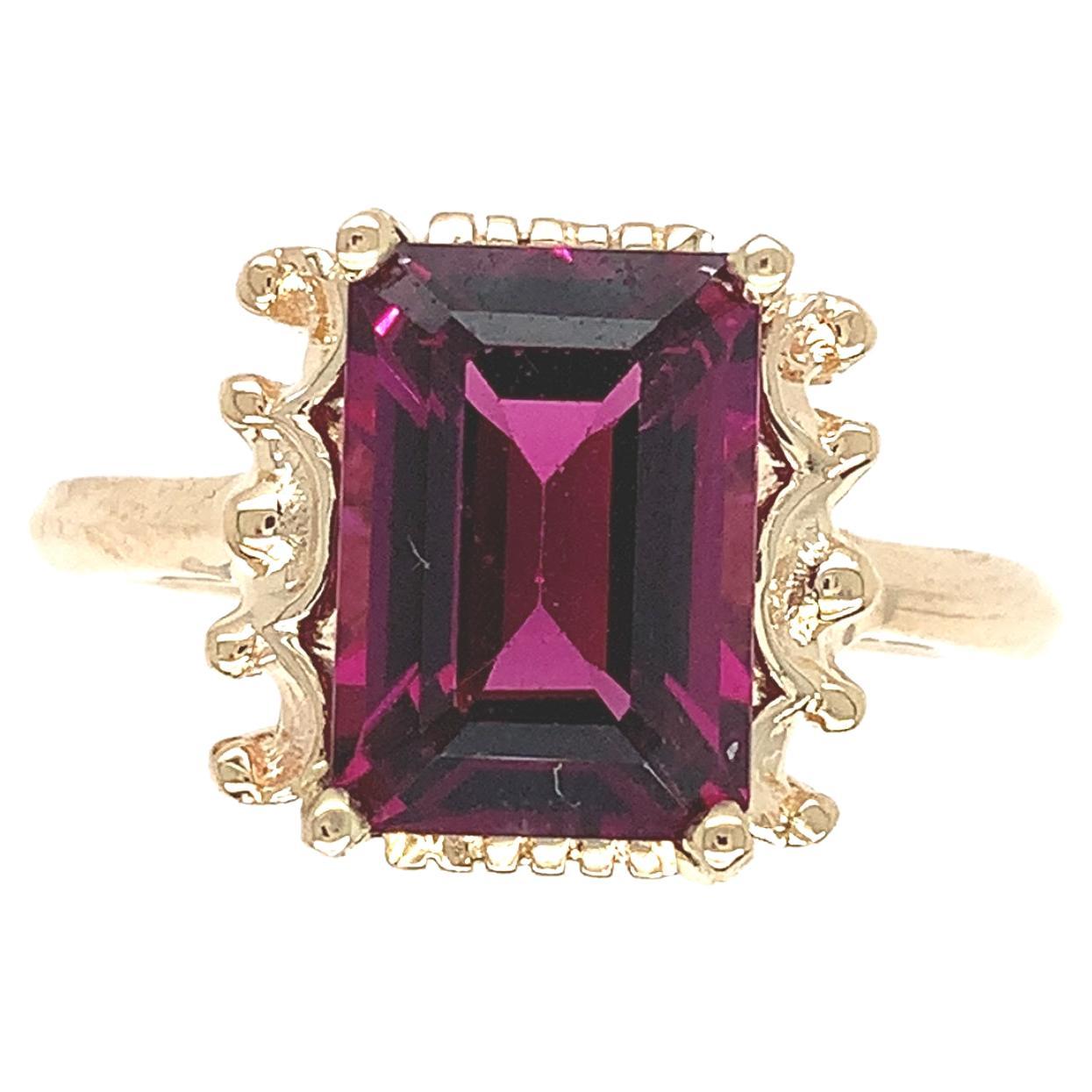 For Sale:  14K Yellow Gold Ring with Emerald Cut 3.51 carat Rhodolite Garnet
