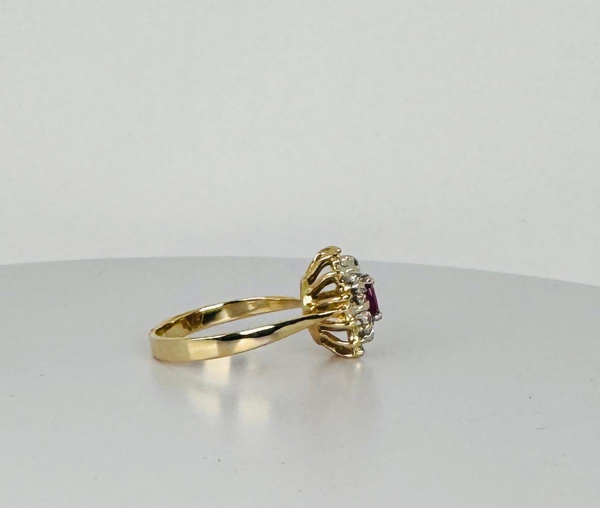 14k yellow gold ring with oval cut natural ruby and 24 brilliant cut diamonds For Sale 2