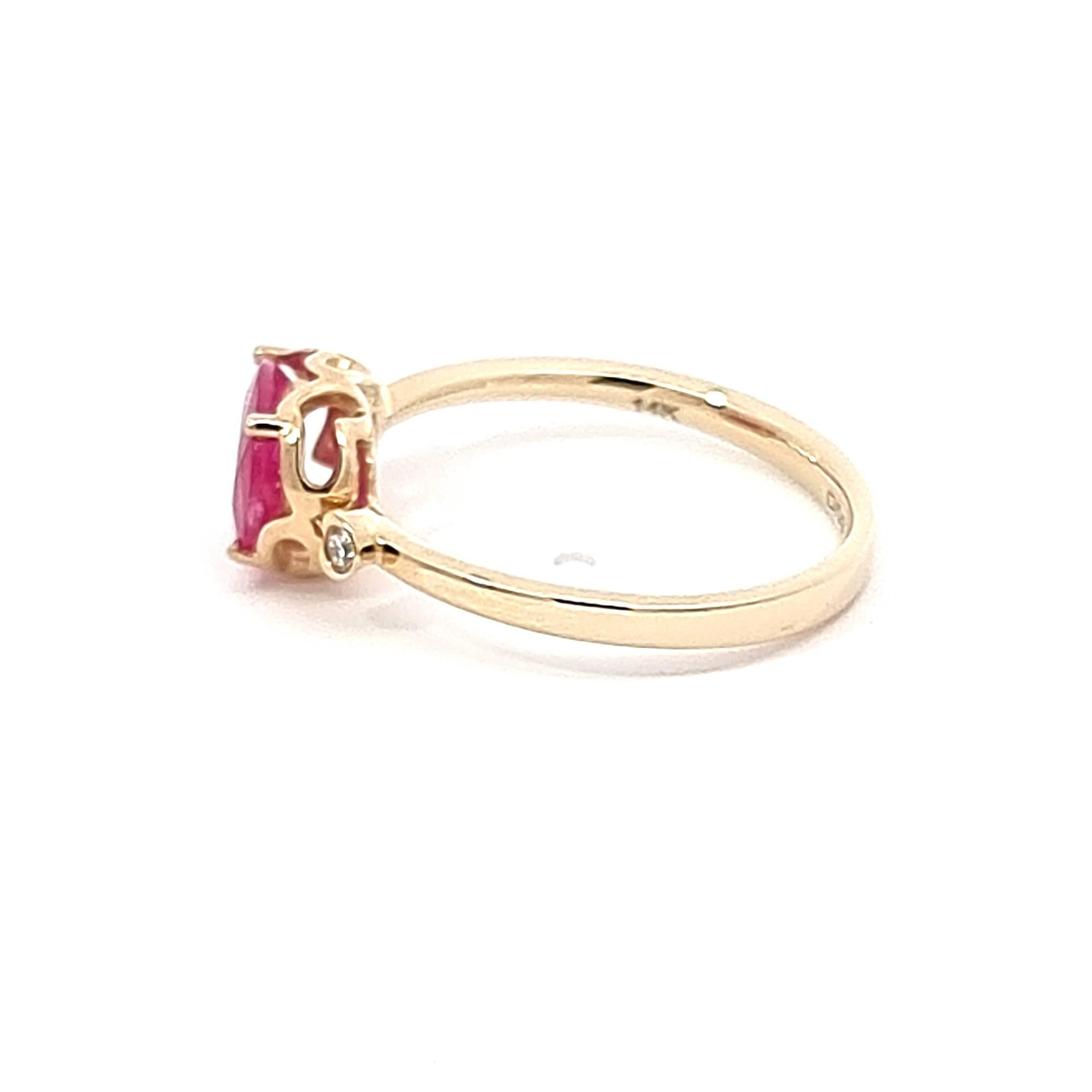 Indulge in radiance with our 14K Yellow Gold Ring, a symphony of elegance and flair. The star of the show is a captivating oval-shaped ruby, a vibrant 1.34-carat embodiment of passion and luxury. Accompanied by two dazzling white diamonds on the