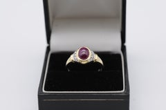 14K yellow gold Ring with red cabochon and diamonds