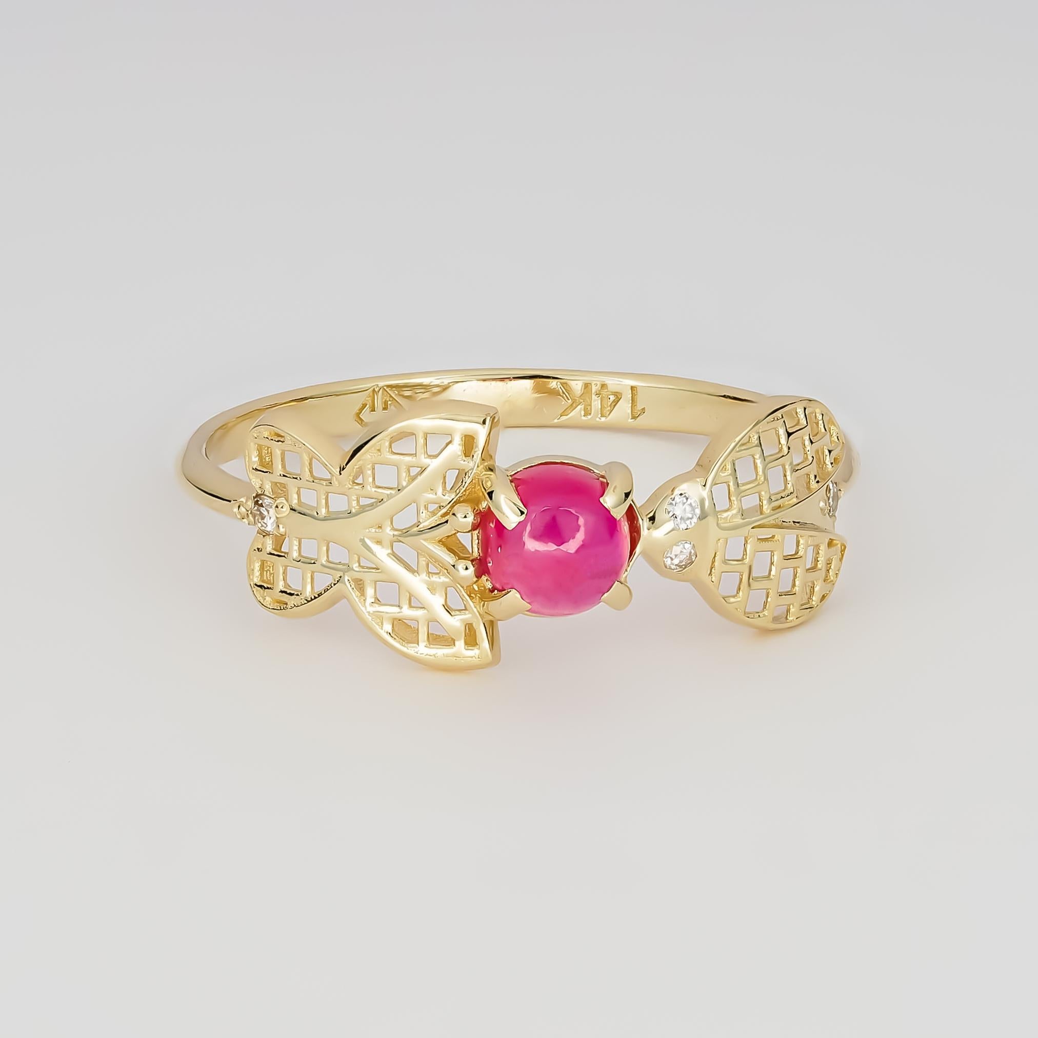 14 karat gold ring with genuine ruby and diamonds. July birthstone.
Weight: 1.25 g. 
Main stone: Genuine ruby
Color: Red
Round cabochon cut, weight - 0.55 ct. approx
Clarity: Transparent with inclusions
Side stones:
Diamonds: 4 pieces, round