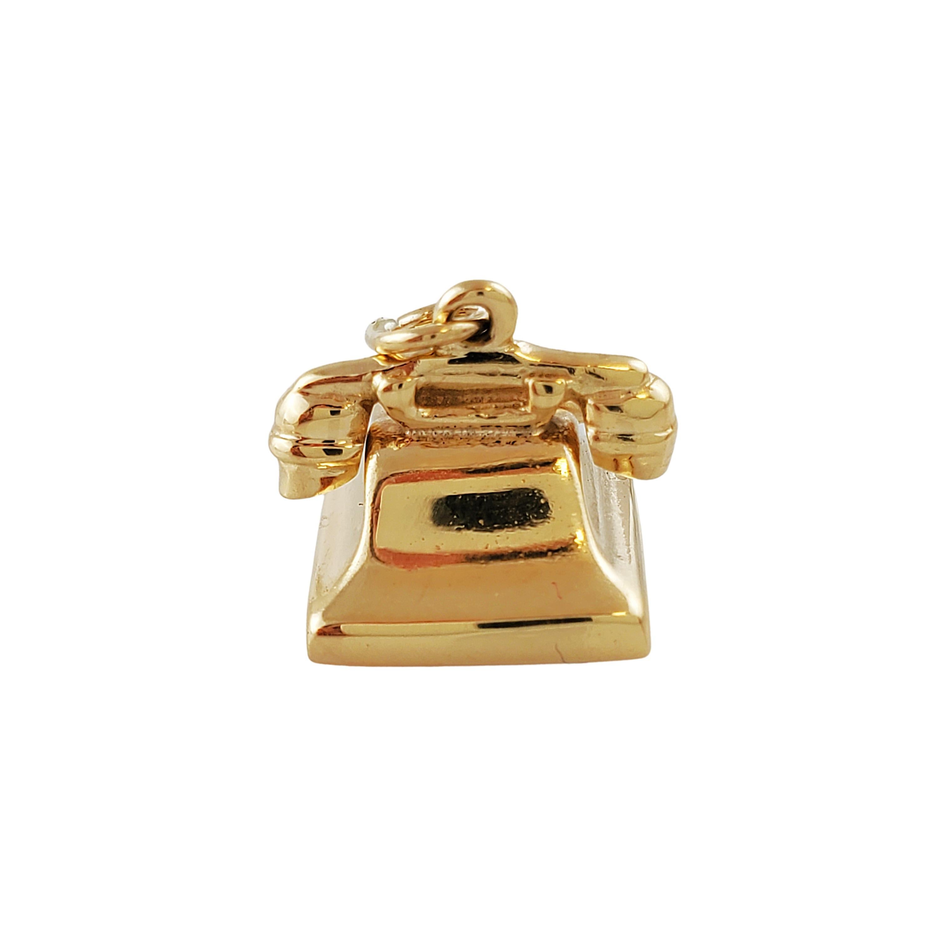 gold rotary phone
