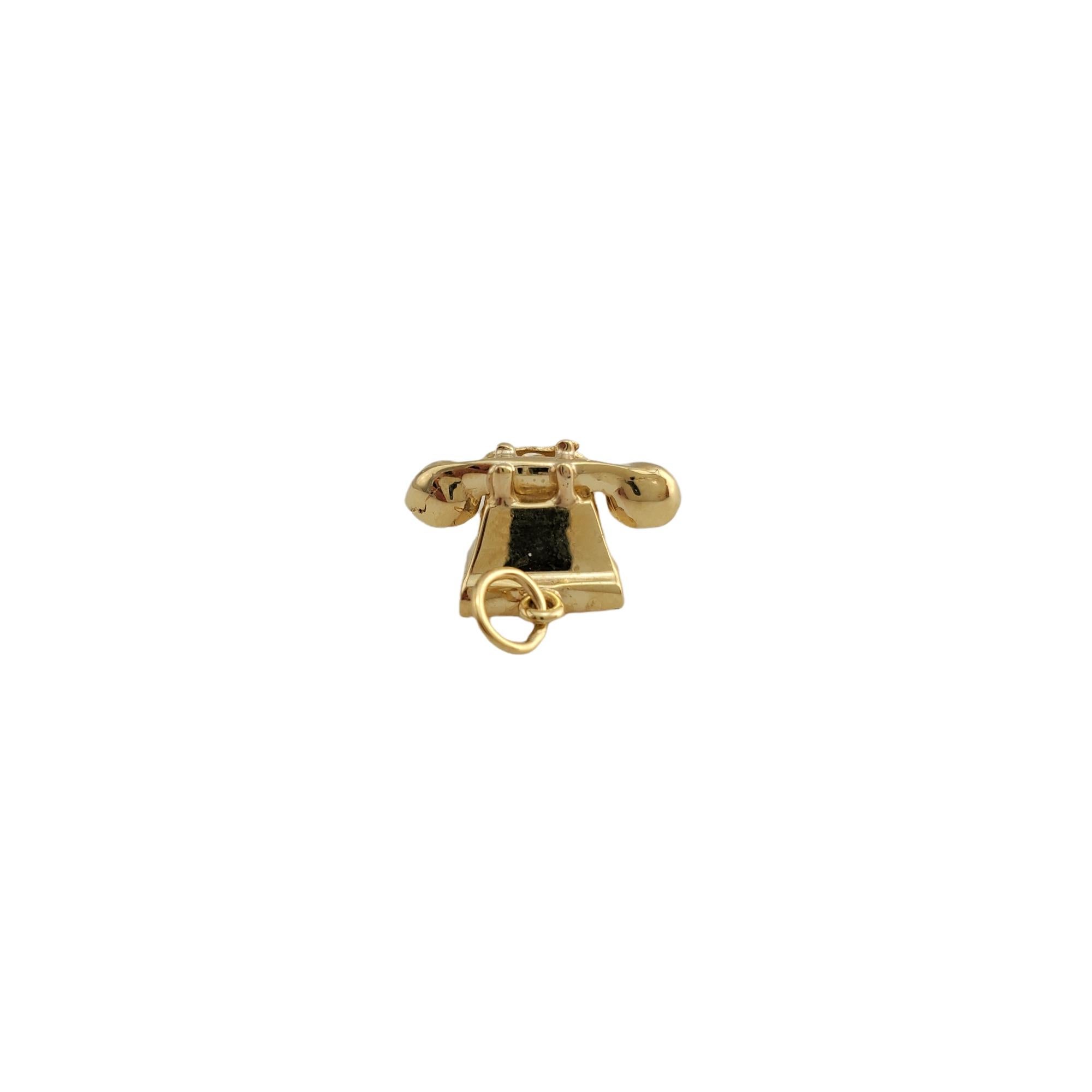 Vintage 14K Yellow Gold Rotary Phone Charm! 

Dial it back with this cute yellow gold rotary phone charm! 

Size: 8.89mm X 17.24mm

Weight: 3.6 gr /  2.3dwt

Hallmark: 14K

Very good condition, professionally polished.

Will come packaged in a gift