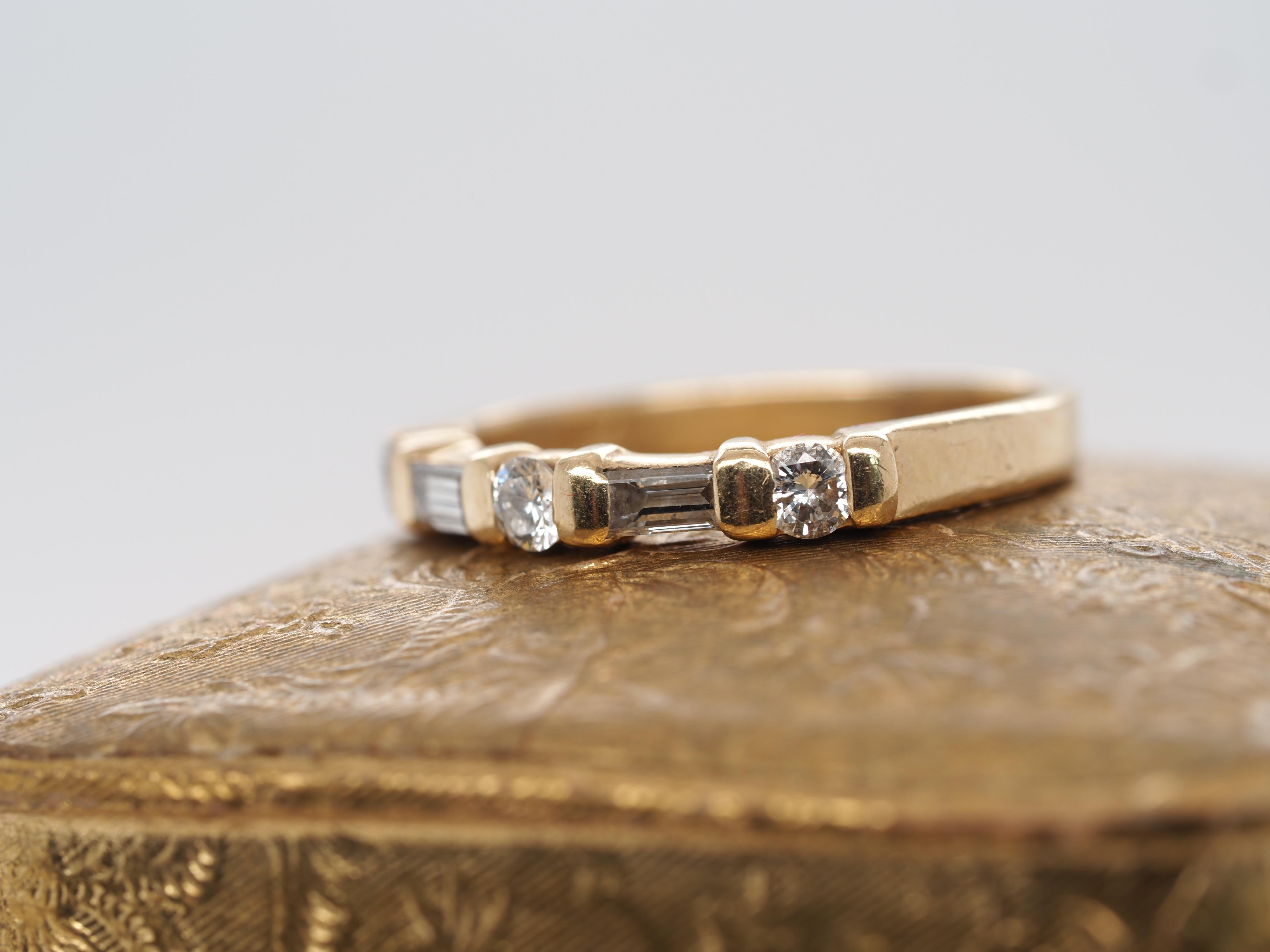 Contemporary 14k Yellow Gold Round and Baguette Diamond Band For Sale
