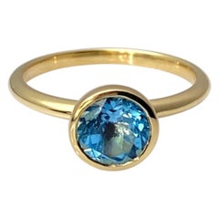 14K Yellow Gold Round Bezel Set Swiss Blue Topaz Solitaire Ring