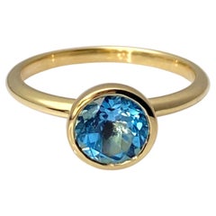 14K Yellow Gold Round Bezel Set Swiss Blue Topaz Solitaire Ring