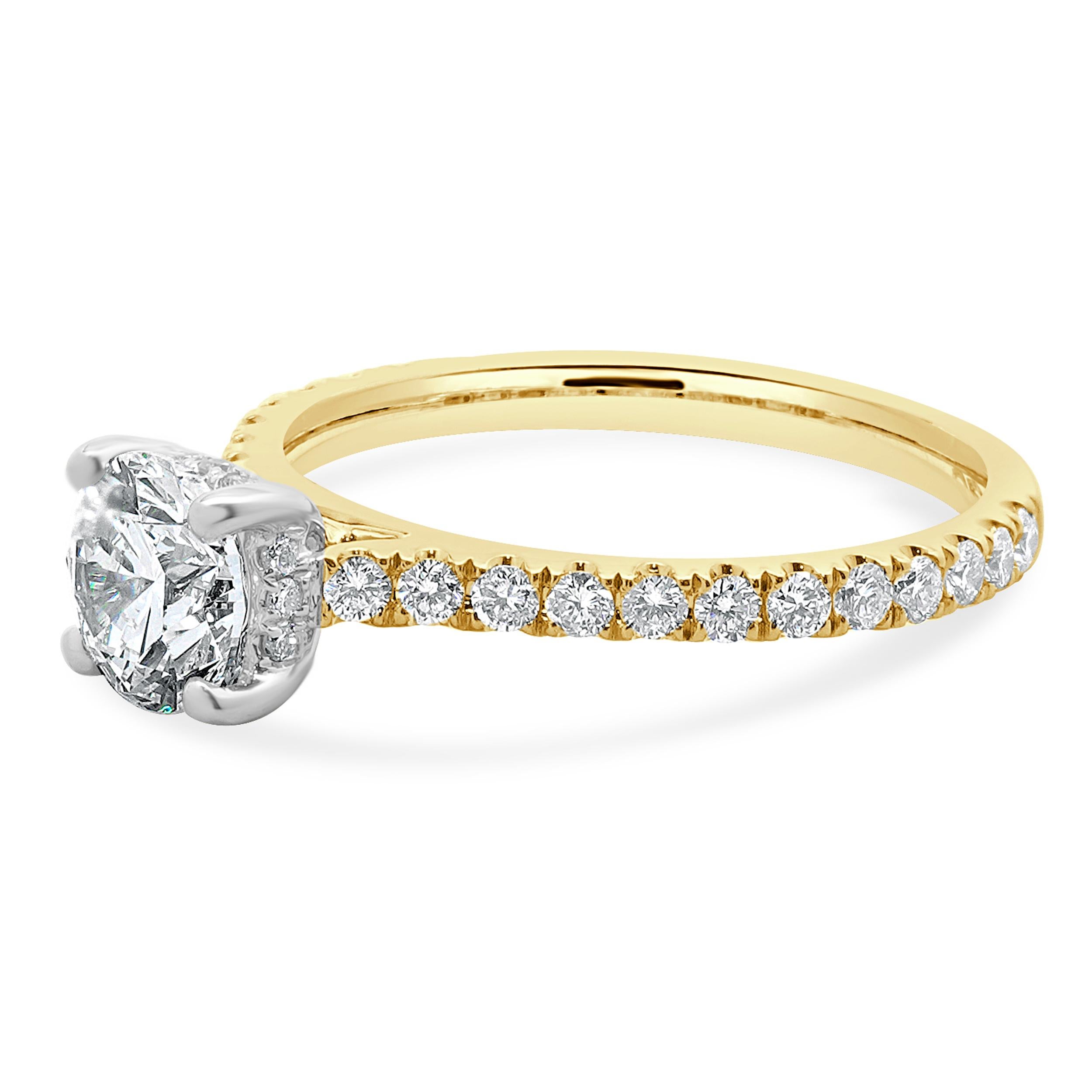 Designer: custom
Material: 14K Yellow Gold
Diamond: 1 round brilliant cut = 1.01ct
Color: H
Clarity: VVS2
Diamond:  36 round brilliant = 0.84cttw
Color: G
Clarity: SI1
Ring Size: 6.75 (complimentary sizing available)
Weight: 2.49 grams
