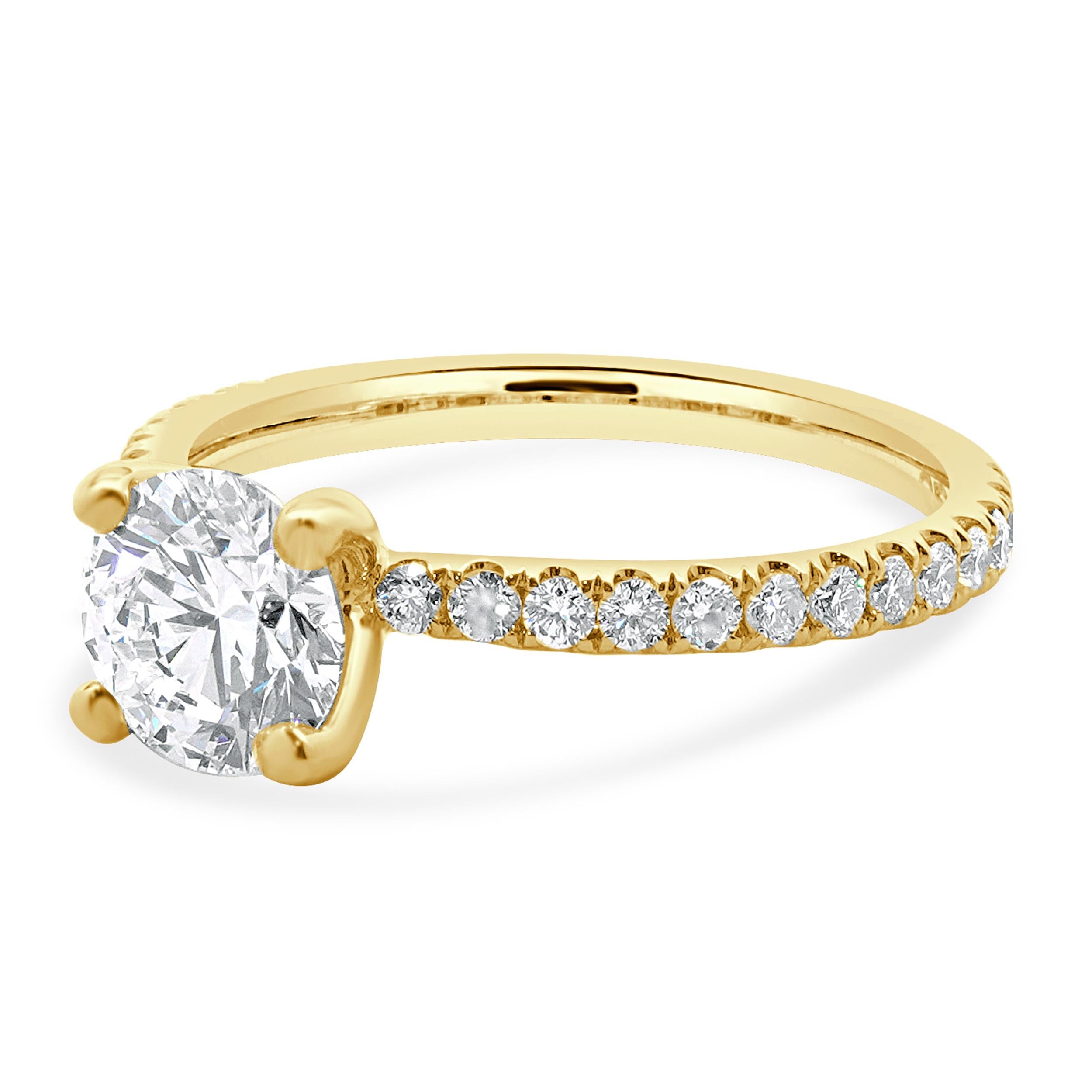 Designer: custom
Material: 14K yellow gold
Diamond: 1 round brilliant cut = 1.13ct
Color: E
Clarity: VVS1
Diamond: 26 round brilliant = 0.26cttw
Color: G
Clarity: SI1
Ring Size: 6.5 (complimentary sizing available)
Weight: 2.62 grams
