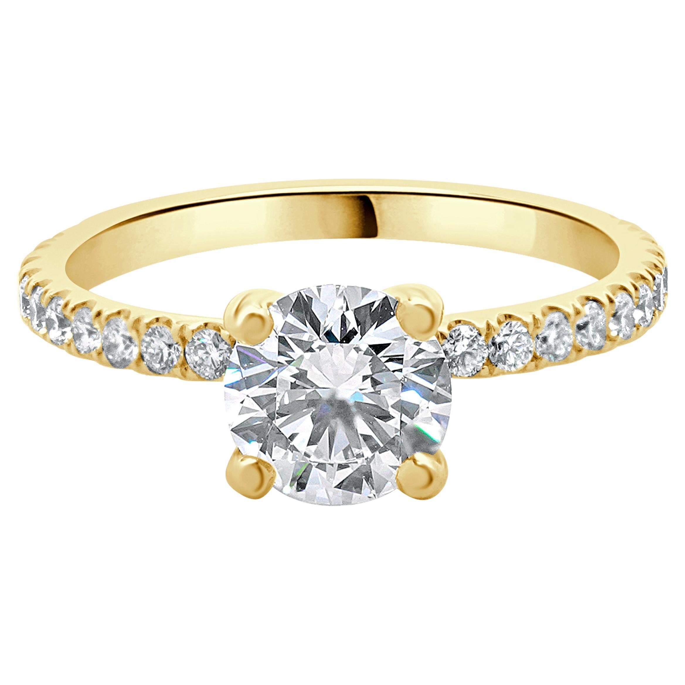 Verlobungsring aus 14 Karat Gelbgold mit rundem Diamanten im Brillantschliff im Angebot