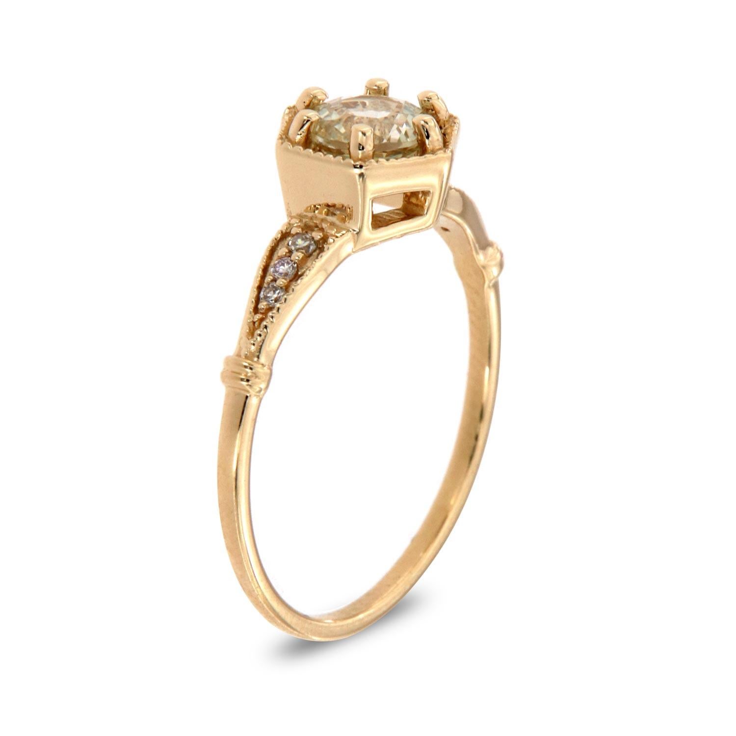 This petite rustic designed ring is impressive in its vintage appeal, featuring a natural near colorless white round sapphire, accented with milgrain and round brilliant diamonds. Experience the difference in person!

Product details: 

Center