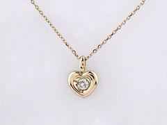 14K Yellow Gold Round Cut Diamond Heart Solitaire Flush Pendant