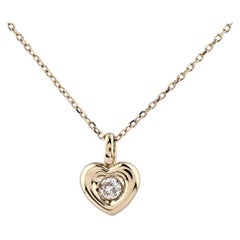 14K Yellow Gold Round Cut Diamond Heart Solitaire Flush Pendant