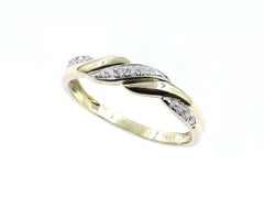 14K Yellow Gold Round Cut Diamond Twisted Infinity Band Ring