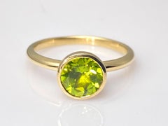 14K Yellow Gold Round Cut Peridot Bezel-Set Solitaire Ring