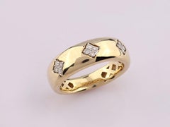 14K Yellow Gold Round Cut Triple Diamond Cluster Dome Ring