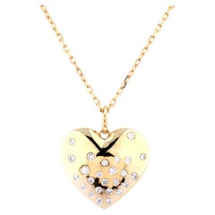 Collier en or jaune 14K avec pendentif en forme de cœur stellaire en diamants ronds