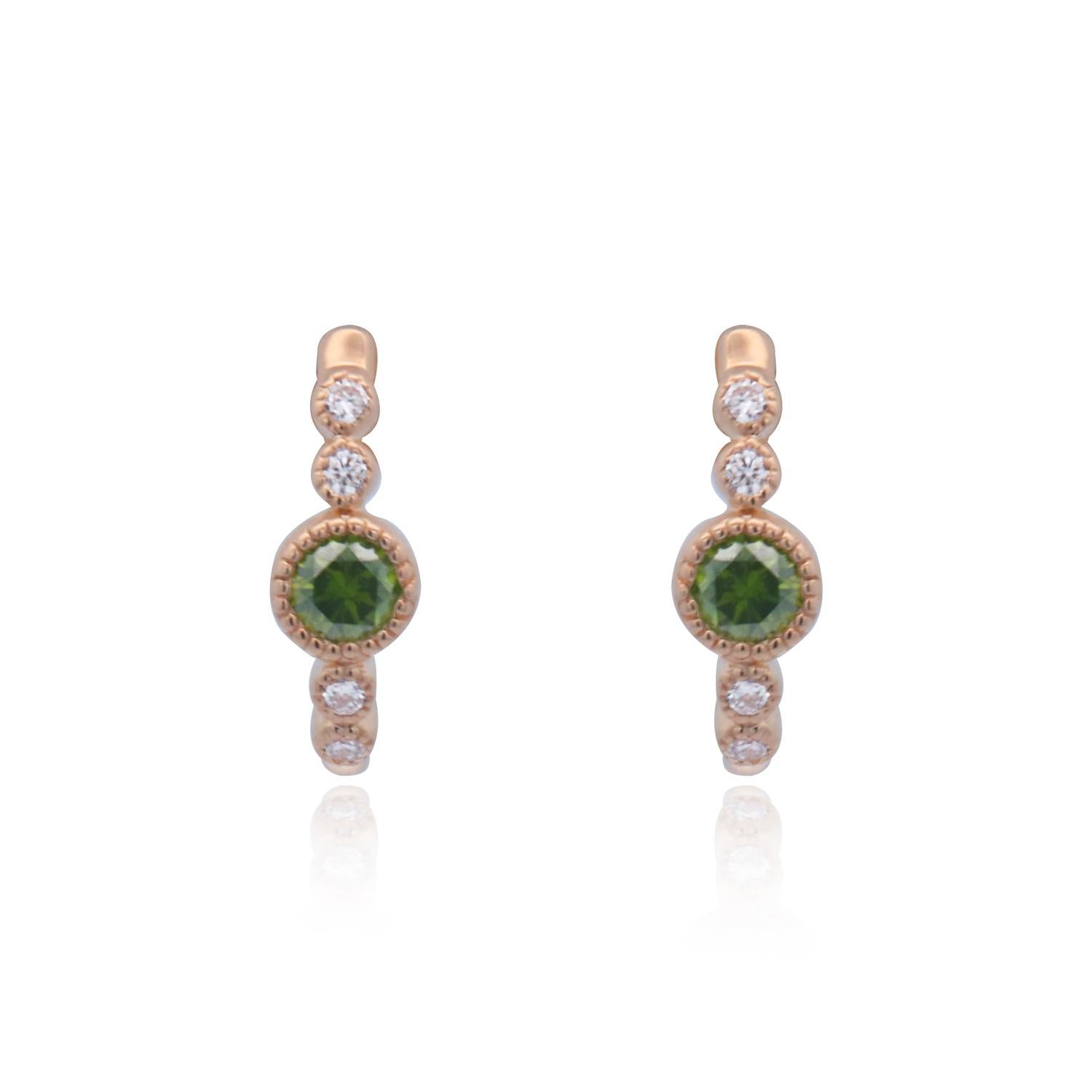 Material: 14K Yellow Gold 
Stone Details: 2 Green Diamonds Diamonds at 0.50 Carats Total Weight
0.15 Carats Total Weight of 8 Round Brilliant Diamonds
Clarity: SI / Color: H-I

Fine one-of-a-kind craftsmanship meets incredible quality in this
