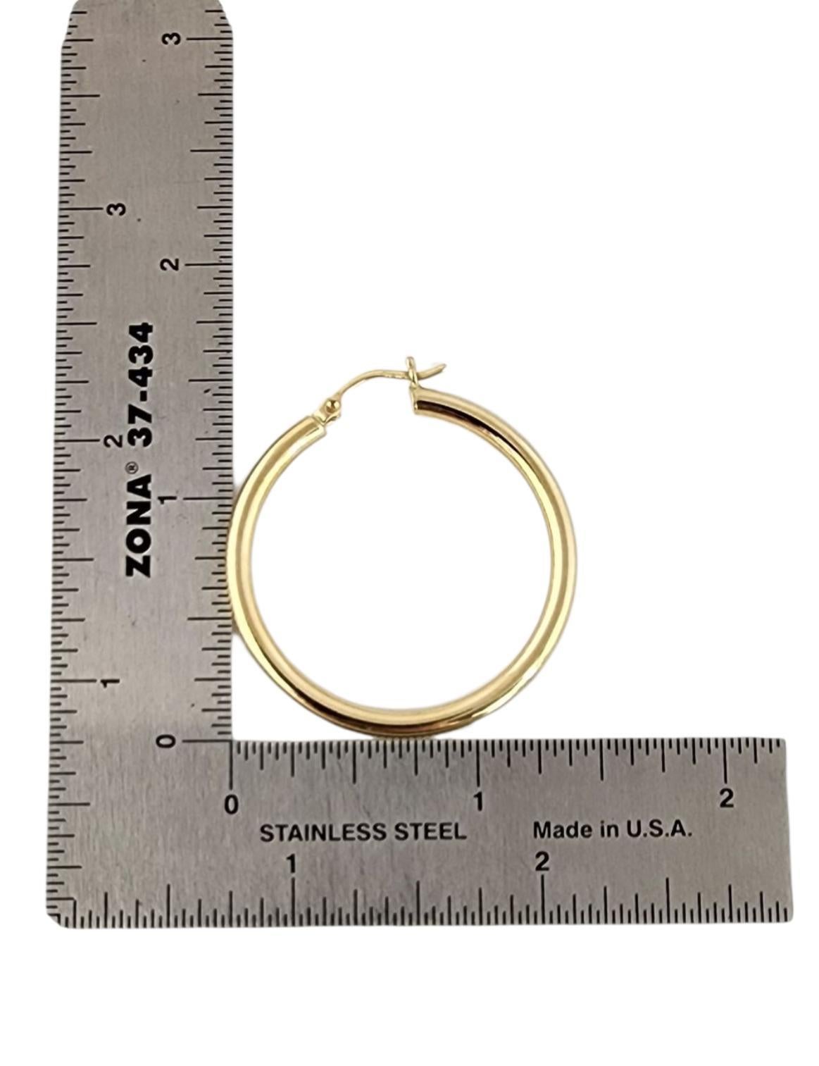 Boucles d'oreilles rondes en or jaune 14K #24006 en vente 1