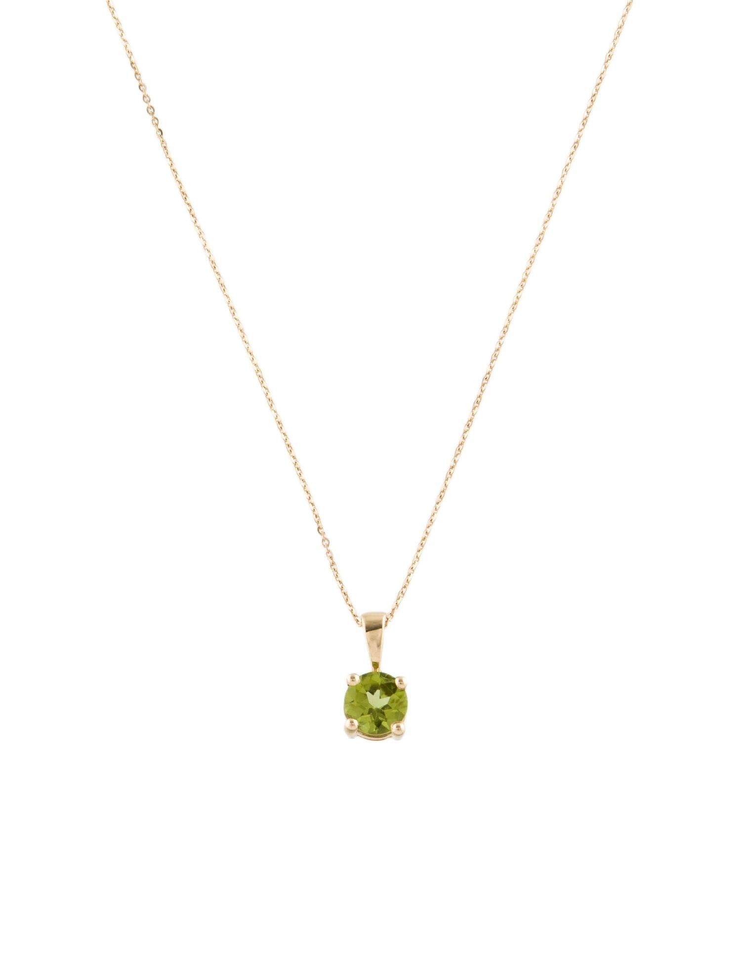 Introducing our exquisite 14K Yellow Gold Peridot Solitaire Pendant Necklace, a masterpiece of refined elegance. This captivating piece features a stunning 1.05 carat round modified brilliant peridot, radiating vibrant green hues that symbolize