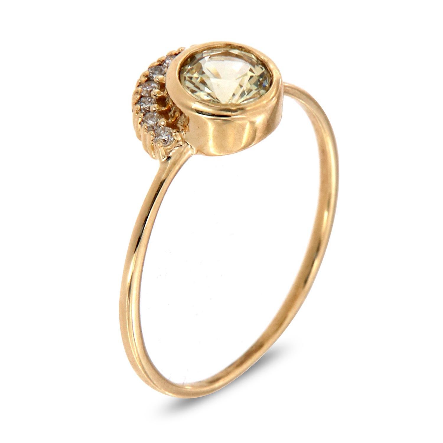 This petite fashion ring is impressive in its vintage appeal, featuring a bezeled natural yellowish round brilliant sapphire, accented with round brilliant diamonds. Experience the difference in person!

Product details: 

Center Gemstone Type: