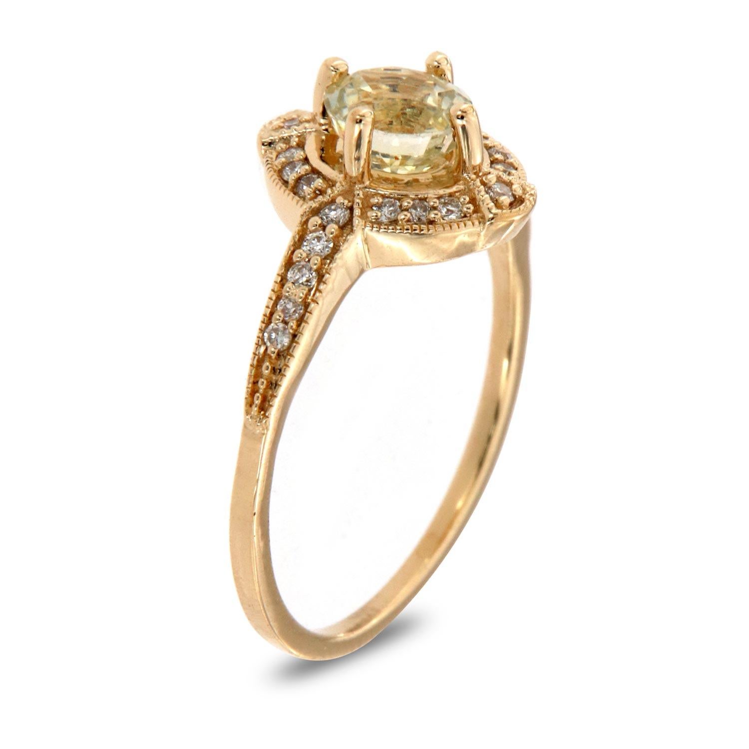 This petite organic style halo ring is impressive in its vintage appeal, featuring a natural light yellow round sapphire, accented with milgrain and round brilliant diamonds. Experience the difference in person!

Product details: 

Center Gemstone