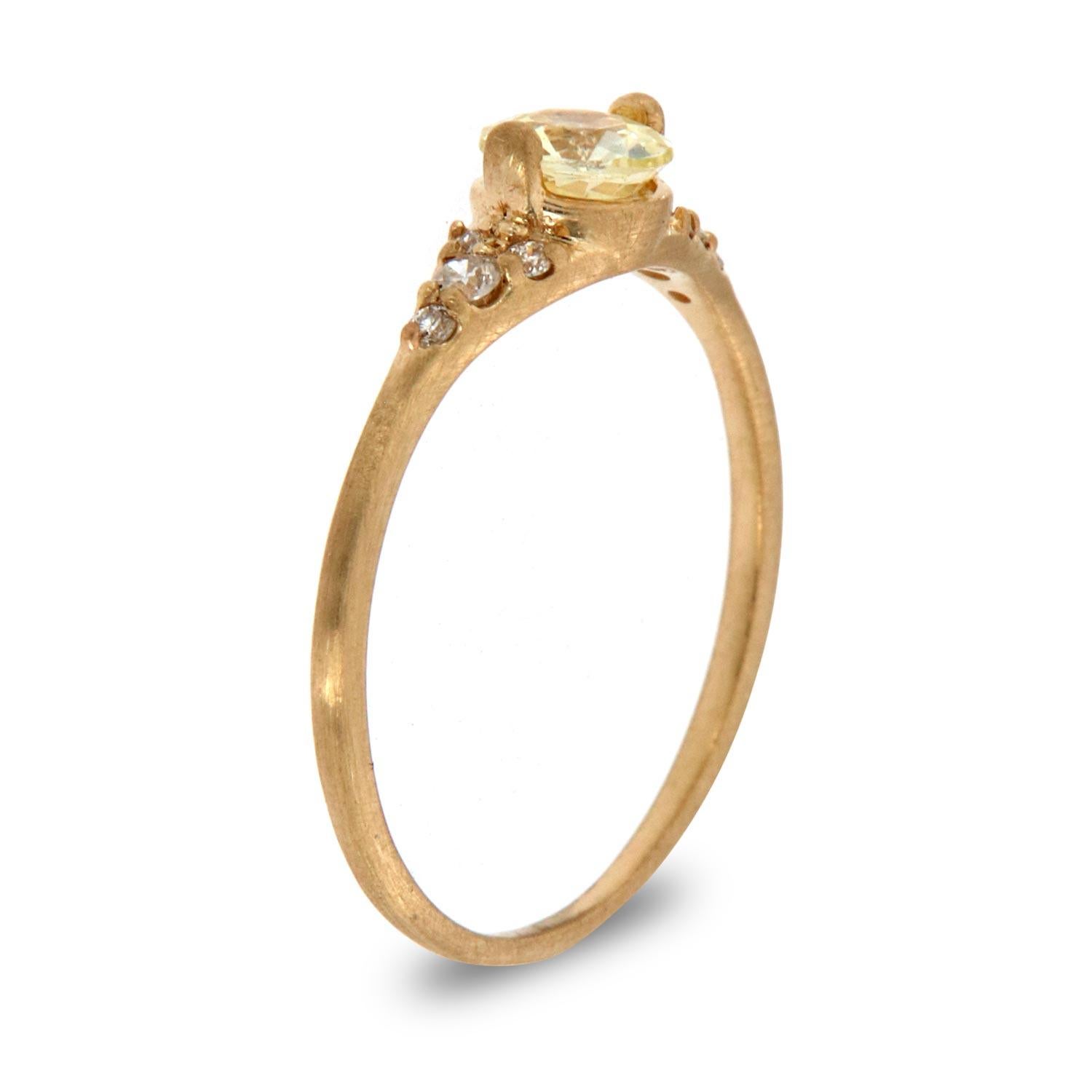 This petite oraganic style rustic ring is impressive in its vintage appeal, featuring a natural yellow round sapphire, accented with round brilliant diamonds. Experience the difference in person!

Product details: 

Center Gemstone Type: