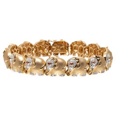 14k Yellow Gold Ruby and Diamond Decorated Elephant Line Bracelet