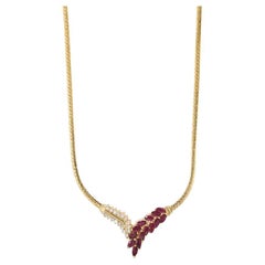 Collar de oro amarillo de 14 quilates con rubíes y diamantes 1,50 ct