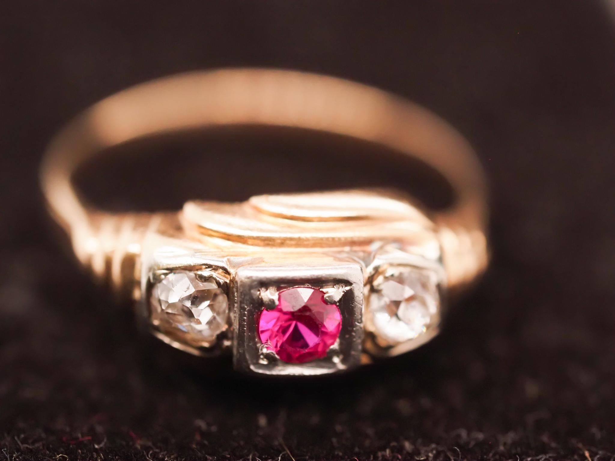 Year: 1920s
Item Details:
Ring Size: 6.75
Metal Type: 14K Yellow Gold [Hallmarked, and Tested]
Weight: 2.3 grams
Diamond Details: Old Mine Brilliant, .15ct total weight, I Color, Si Clarity.
Center Stone Details: .15ct total weight, Ruby, Red Color,