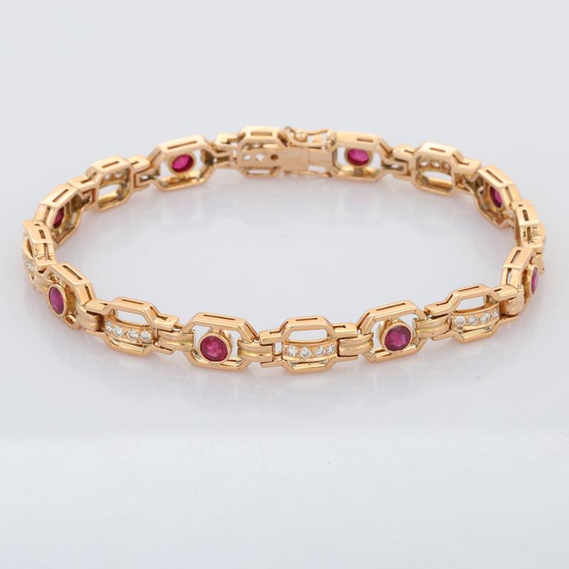 The wearing of charms may have begun as a form of amulet or talisman to ward off evil spirits or bad luck.
This ruby bracelet has a round cut gemstone and diamonds in 14K Gold. A perfect piece of jewelry to adorn your jewelry section.

PRODUCT