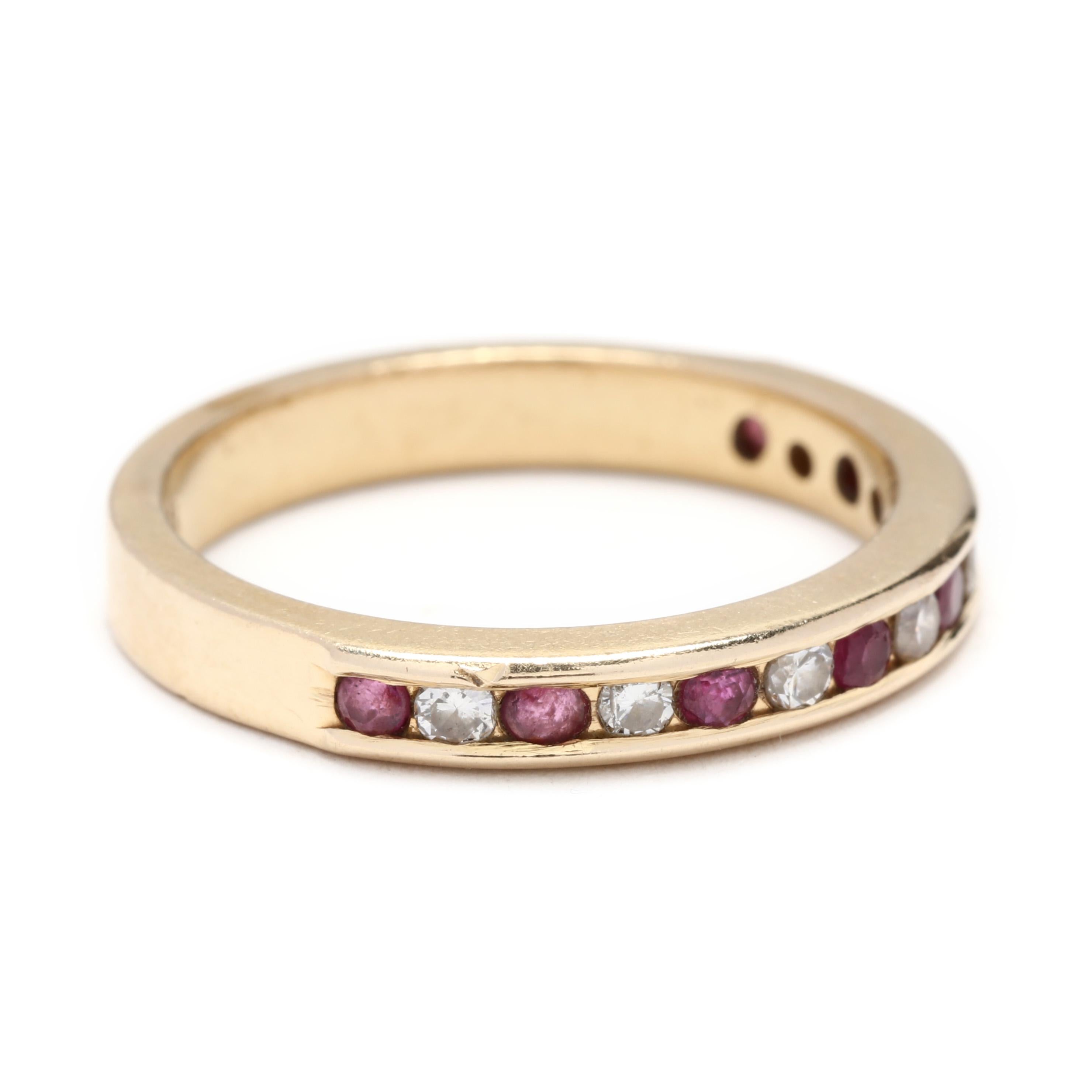 14k yellow gold, ruby & diamond channel set band. A timeless band with round diamonds and rubies in an alternating pattern. A great option for a unique wedding band or in a stack!

Stones:
- rubies, 8 stones
- round cut
- 1.8 mm
- approximately 0.25